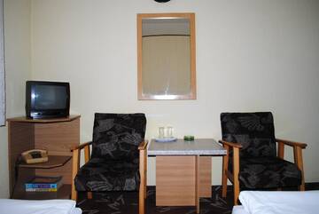 Фото номера Двухместный номер с 2 отдельными кроватями Отель Hotel West г. Шкея 12
